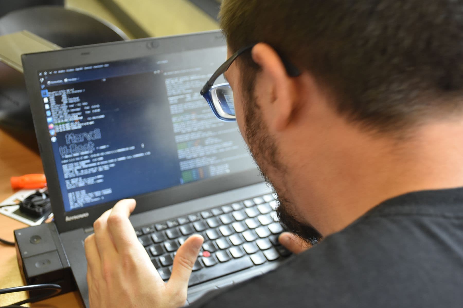 Software developer working on a laptop