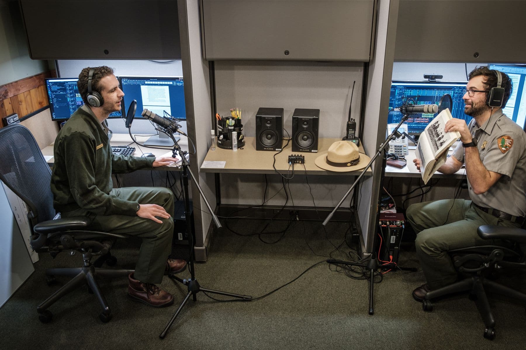 Two people recording a podcast