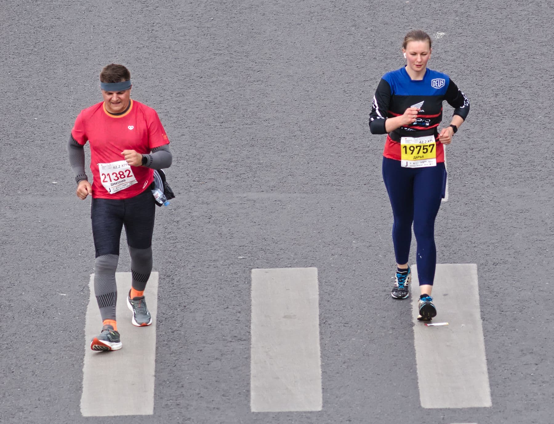Two runners on a road during a race
