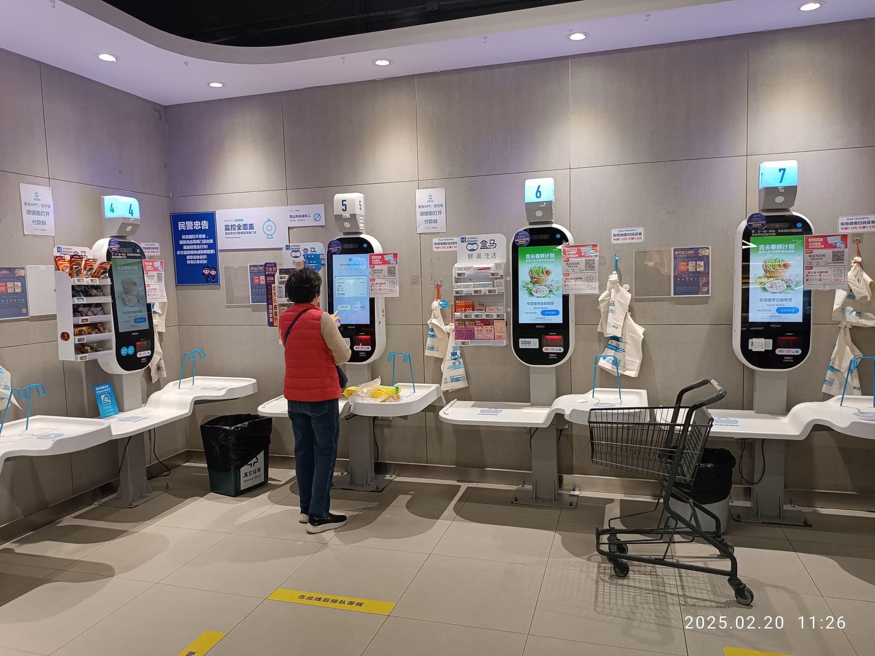 Self-checkout kiosks in a supermarket