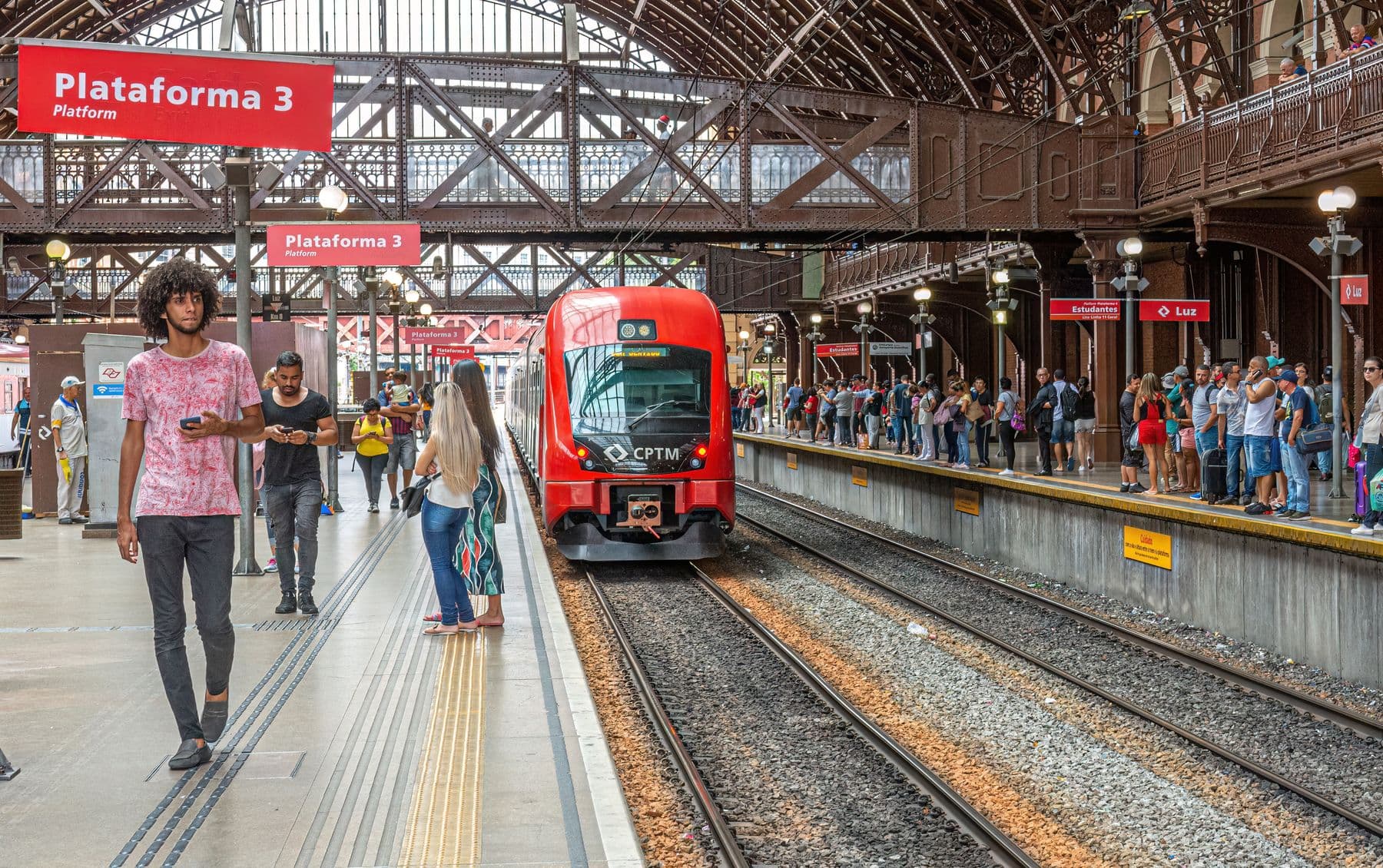 Passengers walking on a train platform